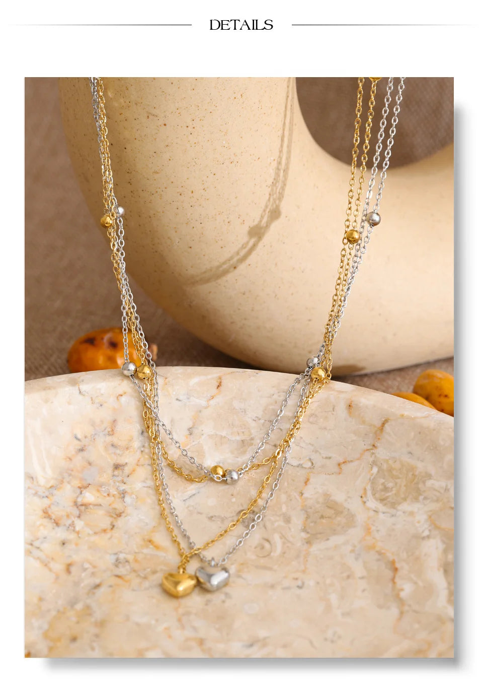 Heart chain necklace in gold-plated stainless steel.