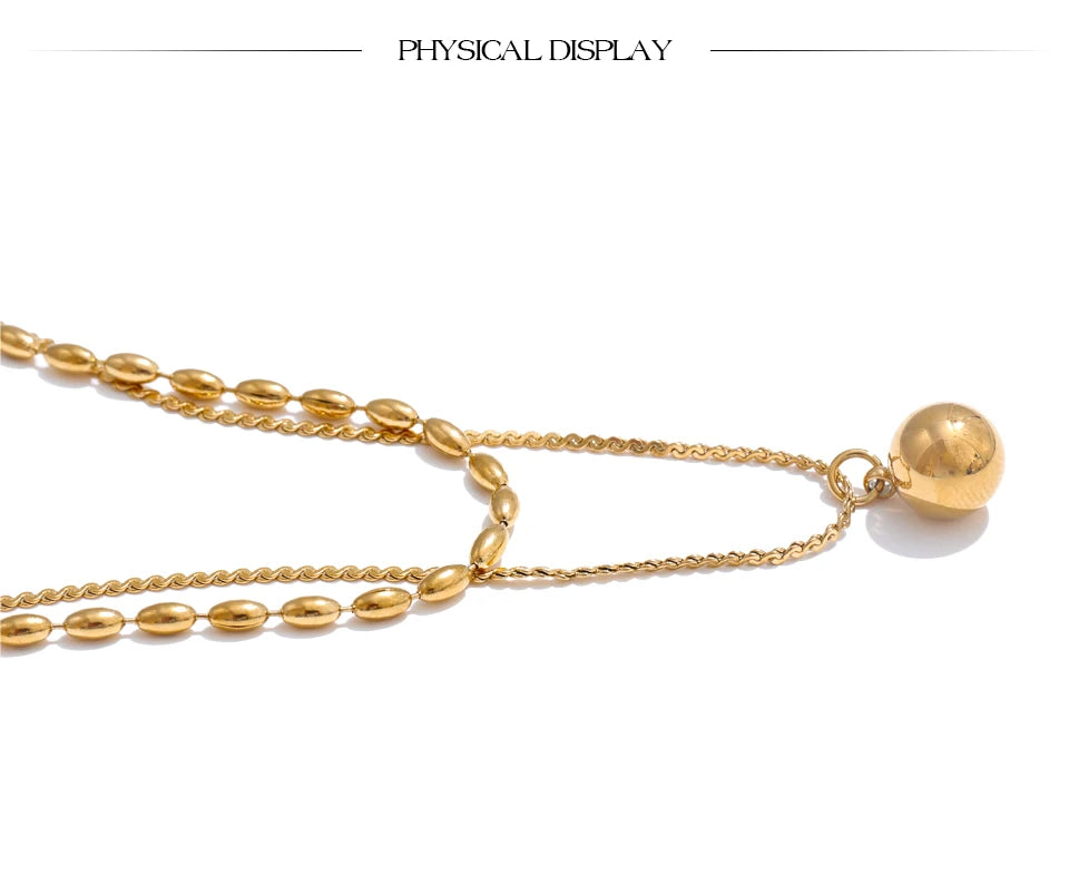 Geometric chain layered necklace in gold-plated stainless steel.