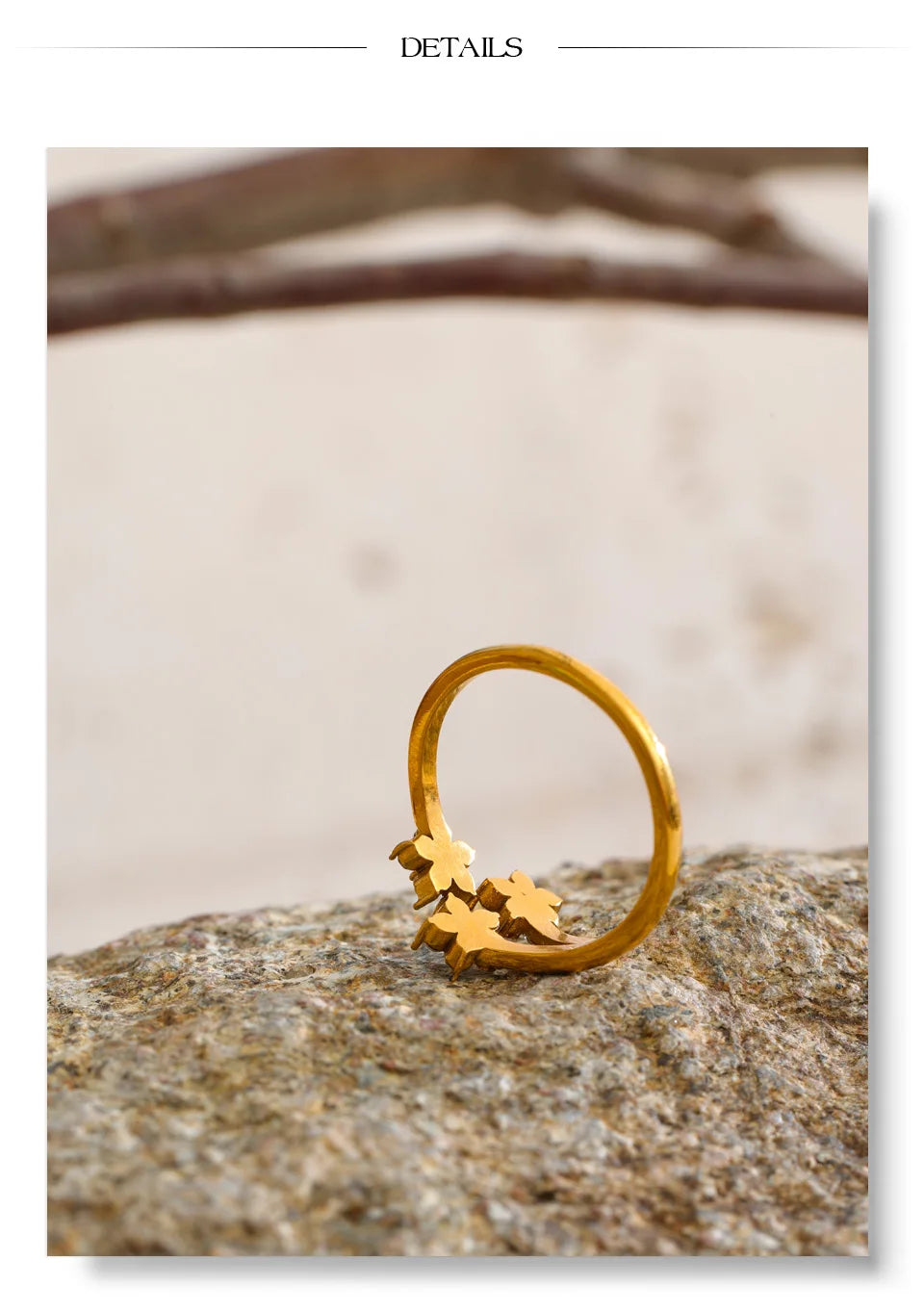 Cubic zirconia flower ring in 18K gold-plated stainless steel with cubic zirconia.