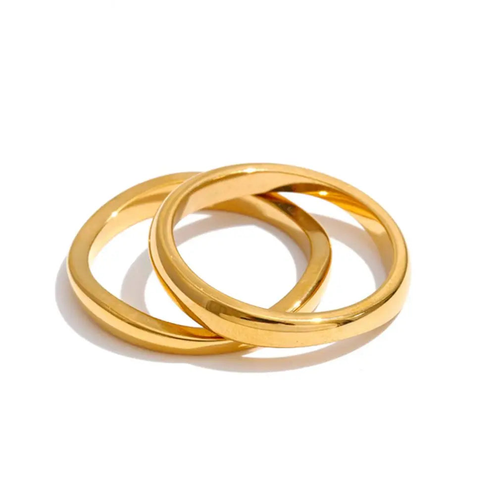 Geometric ring in 18K gold-plated stainless steel.
