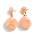 Resin geometric earrings in gold-plated stainless steel with resin.