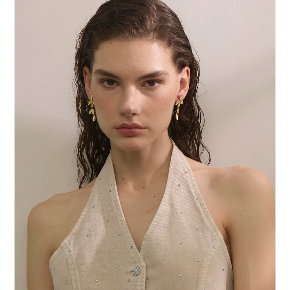 Geometric earrings in gold-plated stainless steel.