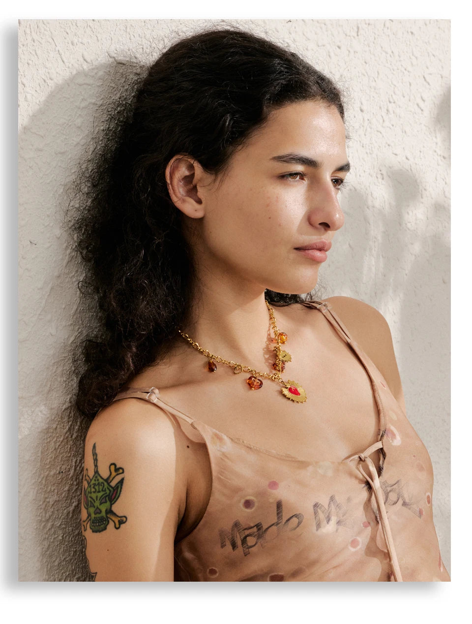 Sun geometric necklace in gold-plated stainless steel.