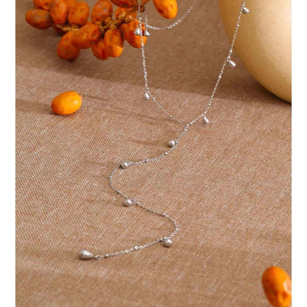 Geometric chain necklace in gold-plated stainless steel.