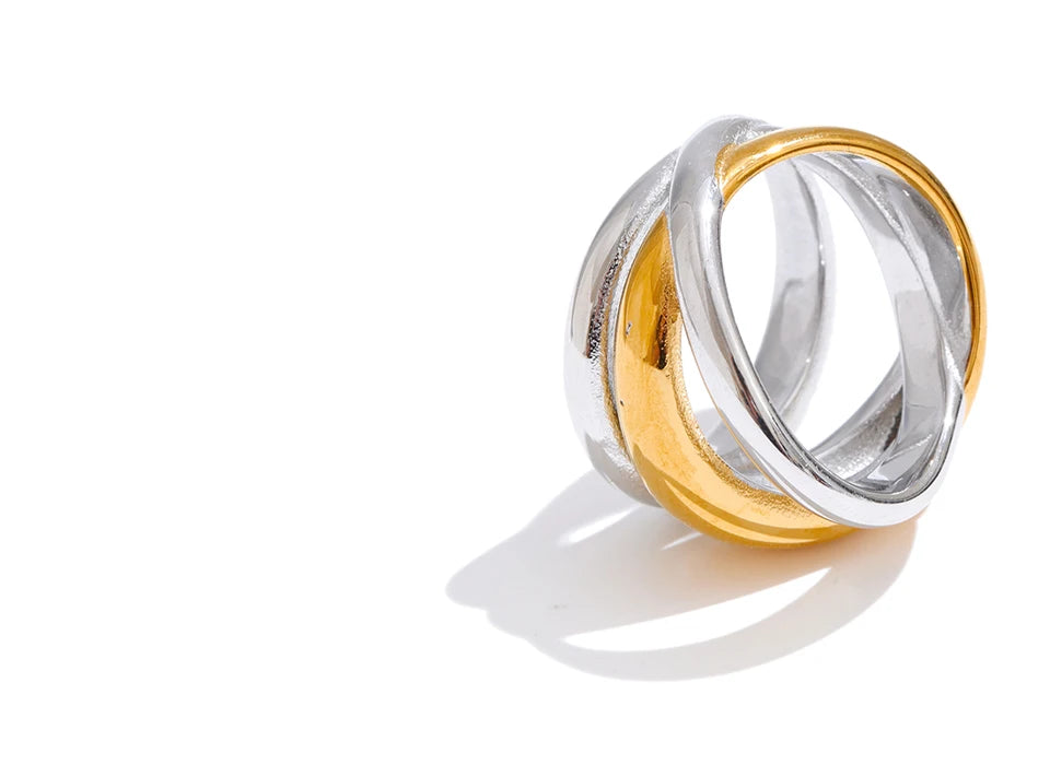 Geometric layered ring in 18K gold-plated stainless steel.