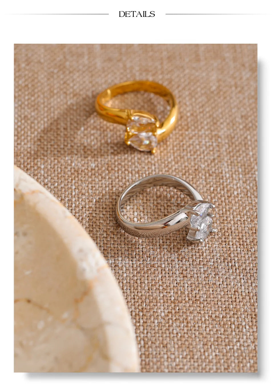 Cubic zirconia geometric ring in 18K gold-plated stainless steel with cubic zirconia.