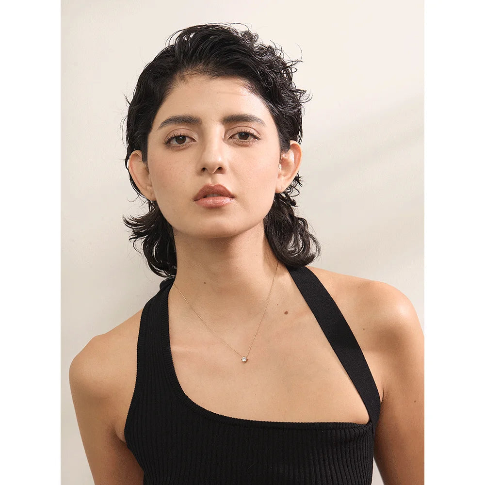 Cubic zirconia geometric necklace in gold-plated stainless steel with cubic zirconia.