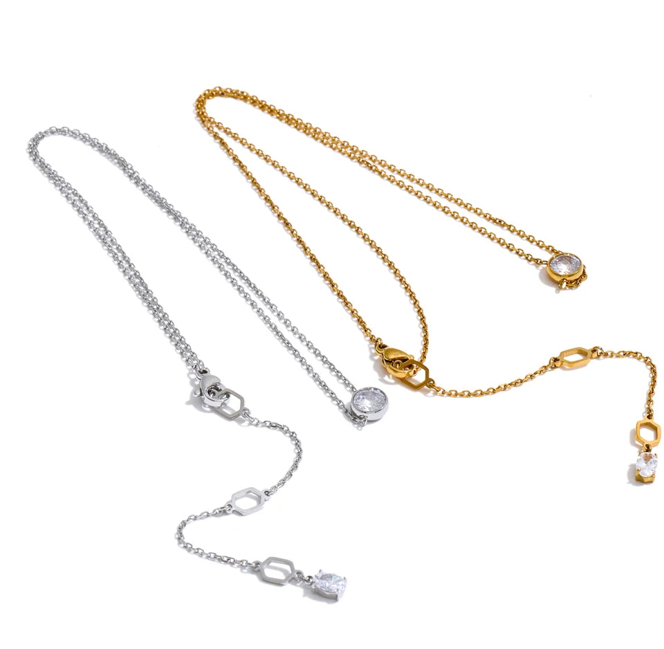 Cubic zirconia geometric necklace in gold-plated stainless steel with cubic zirconia.