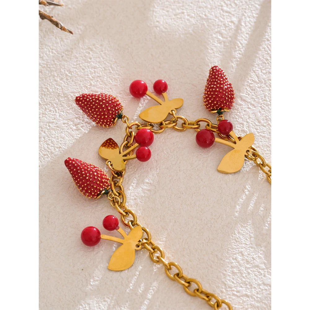 Red acrylic enamel necklace in gold-plated stainless steel with acrylic and enamel.
