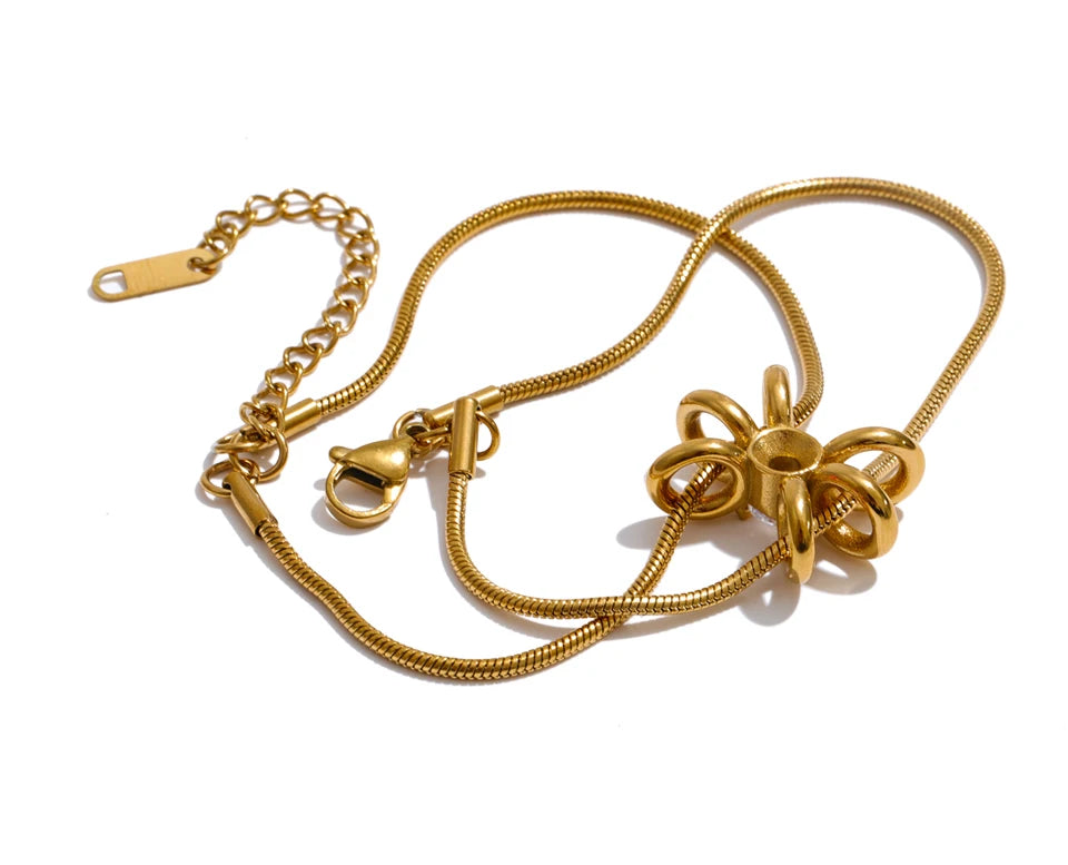 Cubic Zirconia Flower Geometric Bracelet — Gold-Plated Stainless Steel with Cubic Zirconia · PS1406