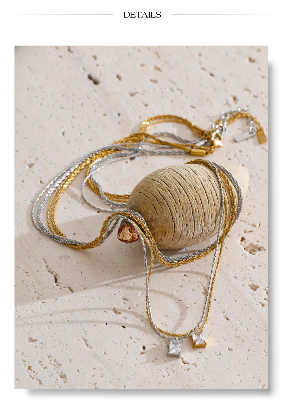 Cubic zirconia geometric chain necklace in gold-plated stainless steel with cubic zirconia.