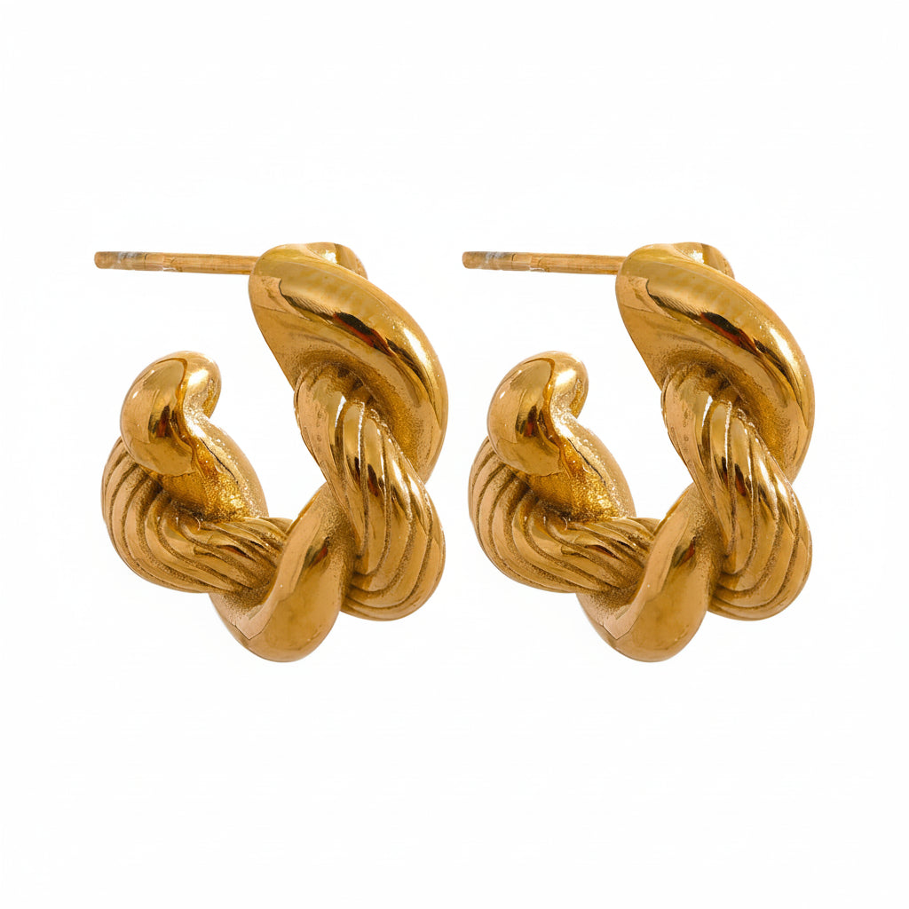 Gold-plated 316l stainless steel earrings with intricate swirl design.