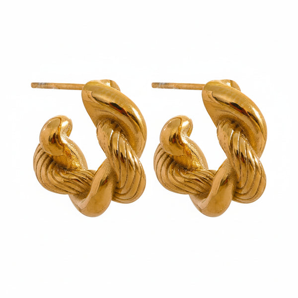 Gold-plated 316l stainless steel earrings with intricate swirl design.