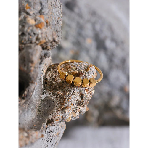 Beaded geometric ring in 18K gold-plated stainless steel.