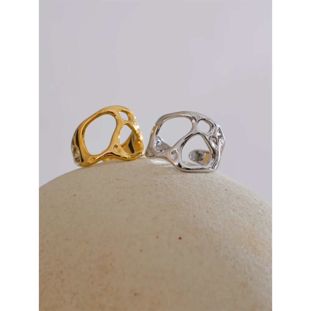 Geometric ring in gold-plated stainless steel.