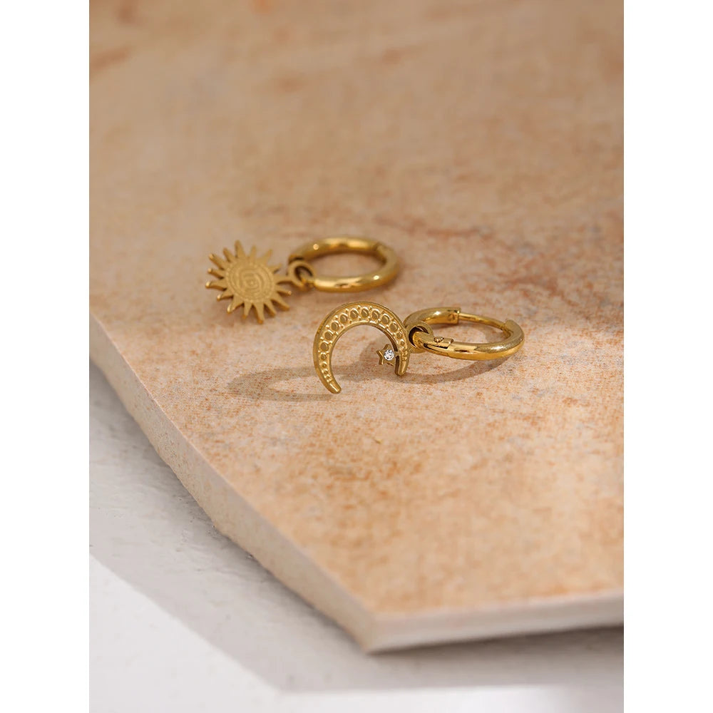 Star moon hammered earrings in gold-plated stainless steel.