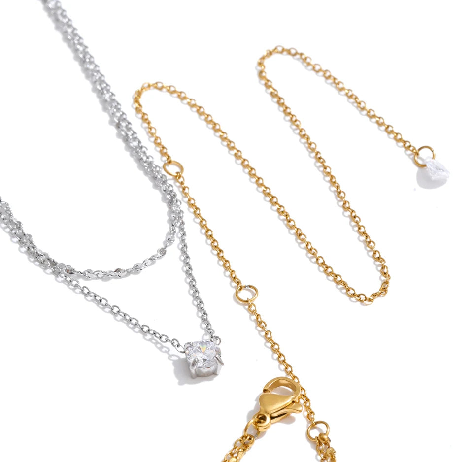 Cubic zirconia geometric chain necklace in gold-plated stainless steel with cubic zirconia.