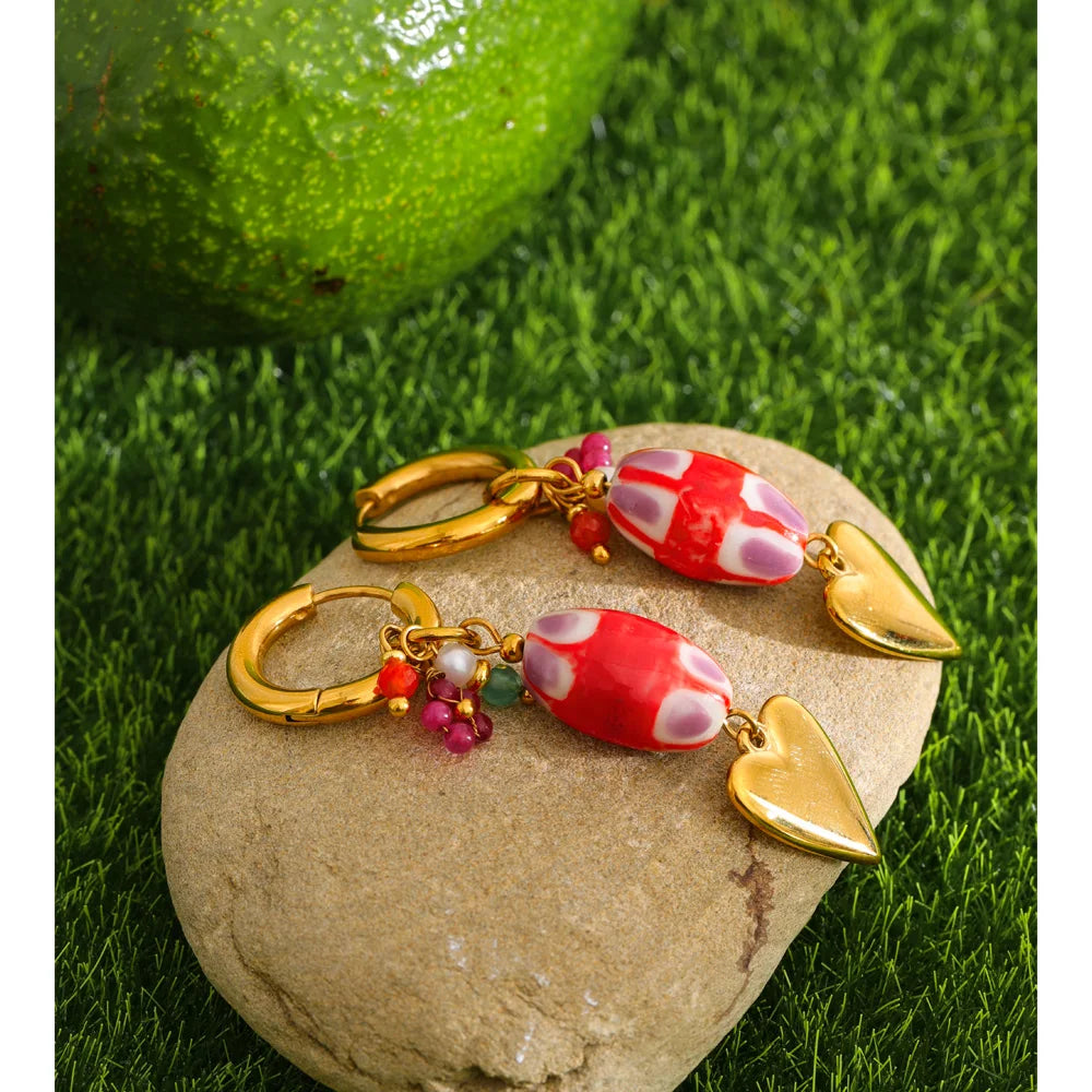 Red heart earrings in gold-plated stainless steel.