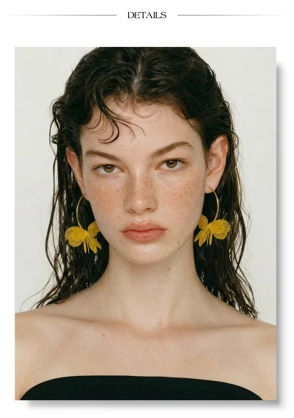 Flower earrings in gold-plated stainless steel.