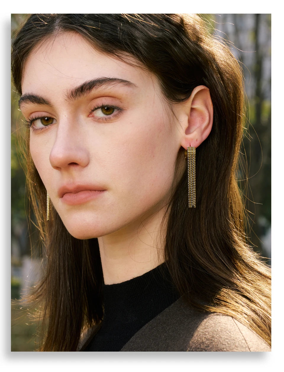 Geometric chain earrings in gold-plated stainless steel.