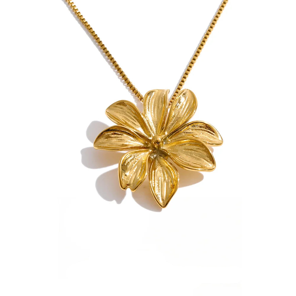 Gold-plated stainless steel necklace with a large flower pendant.