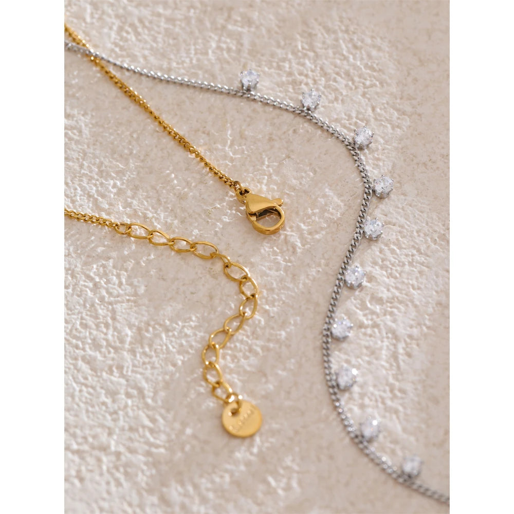 Cubic zirconia geometric chain necklace in gold-plated stainless steel with cubic zirconia.