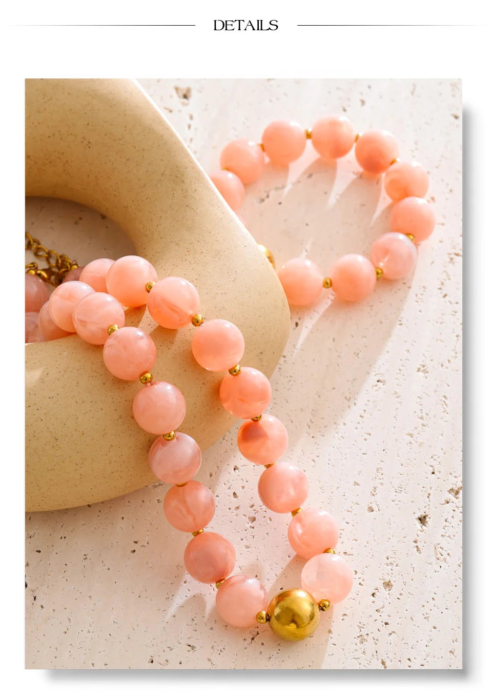 Resin beaded multi-color necklace in gold-plated stainless steel with resin.