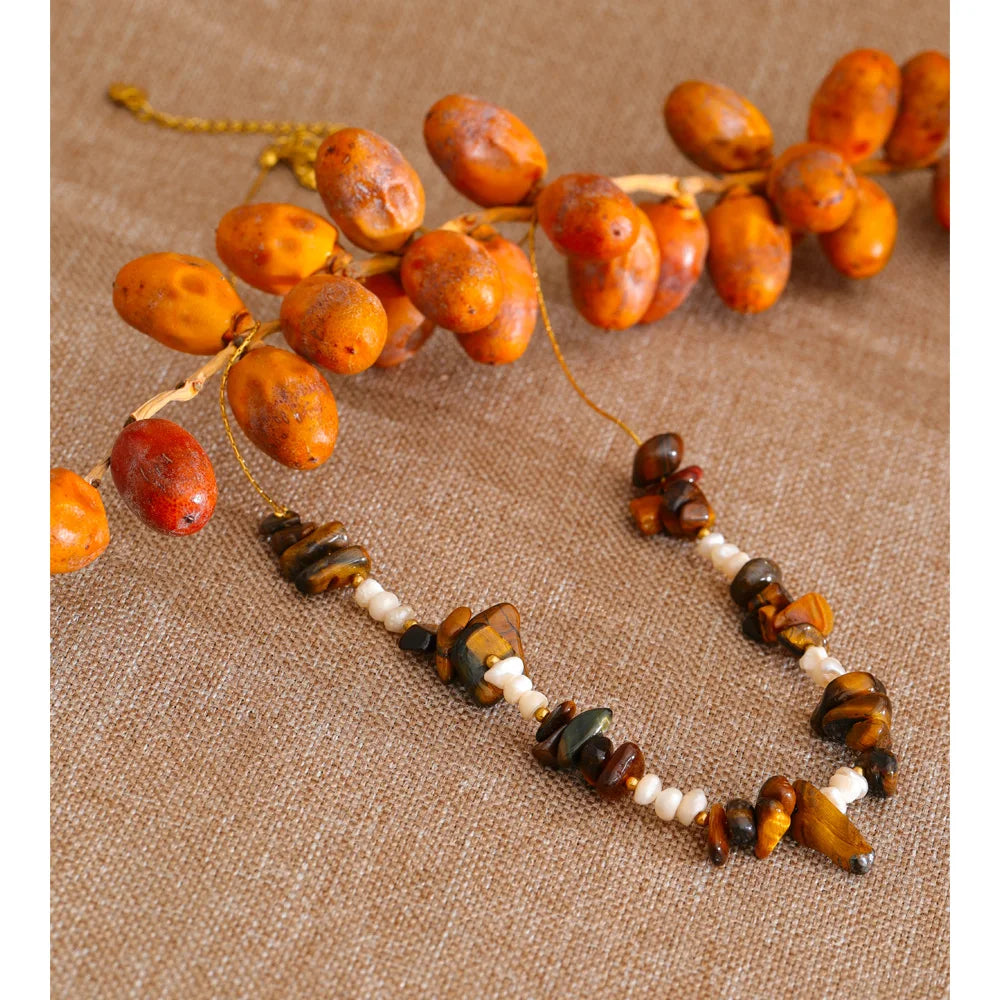 Pearl natural stone multi-color necklace in gold-plated stainless steel with pearl and natural stone.