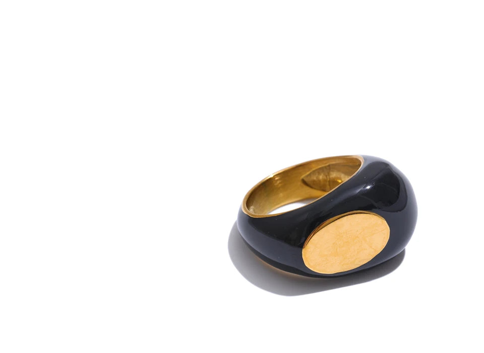 Black enamel geometric ring in gold-plated 316L stainless steel with enamel.