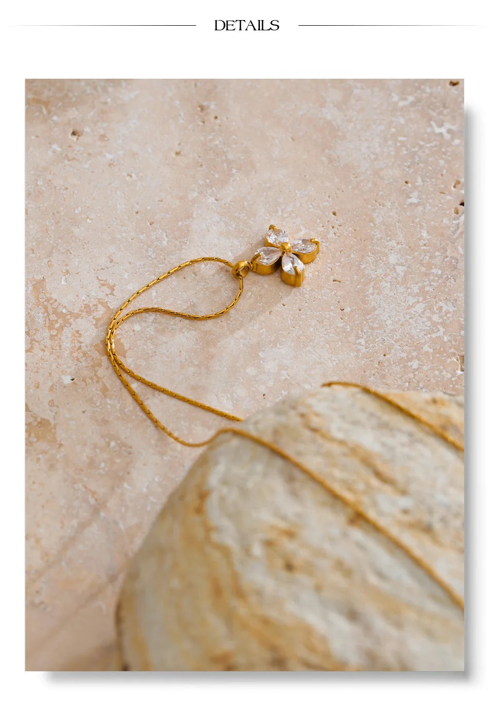 Cubic zirconia flower necklace in gold-plated stainless steel with cubic zirconia.
