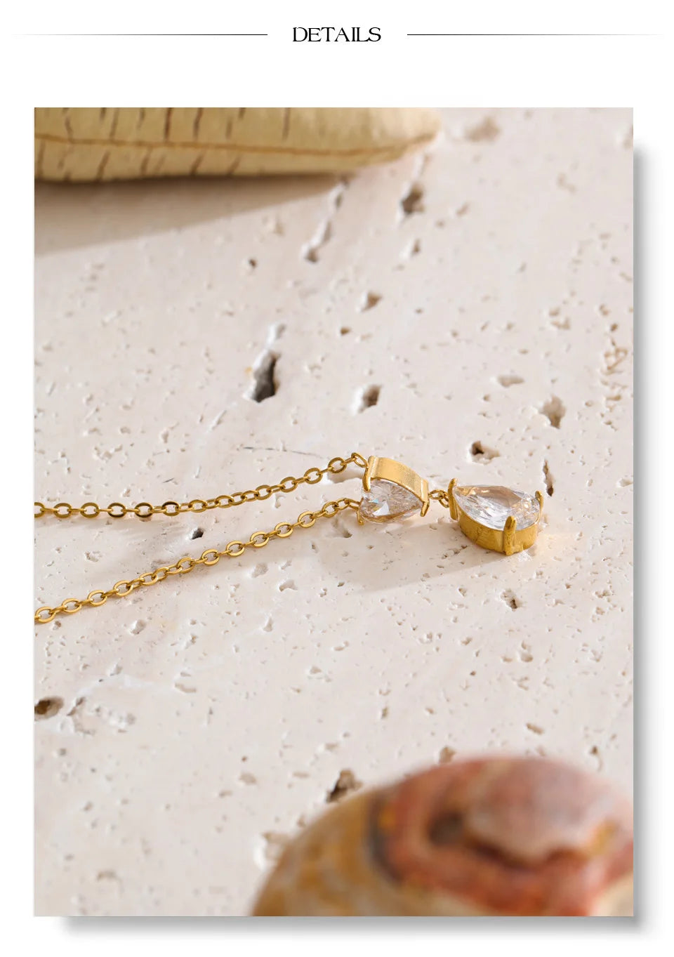 Cubic zirconia heart necklace in gold-plated stainless steel with cubic zirconia.