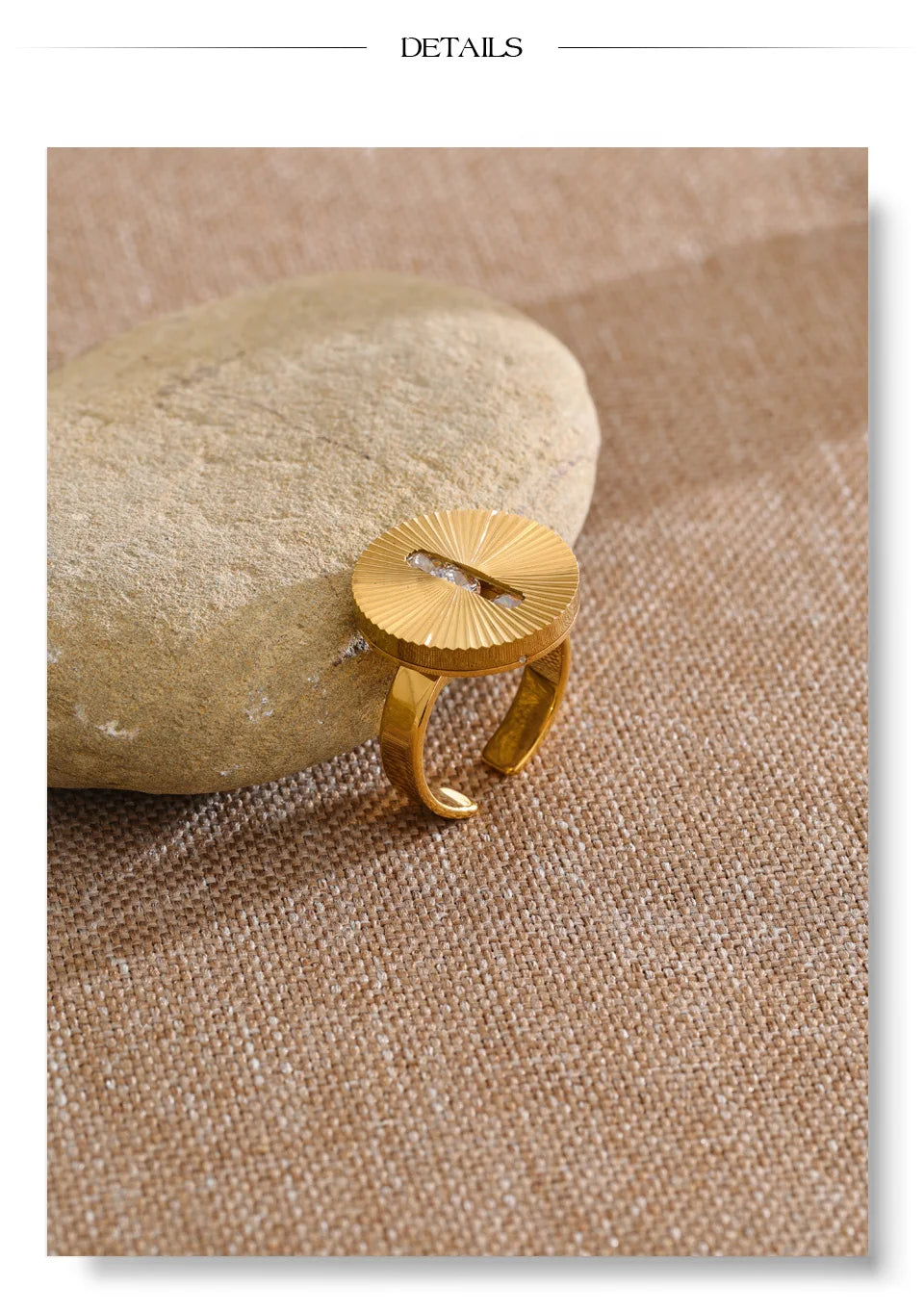 Cubic zirconia geometric ring in 18K gold-plated stainless steel with cubic zirconia.