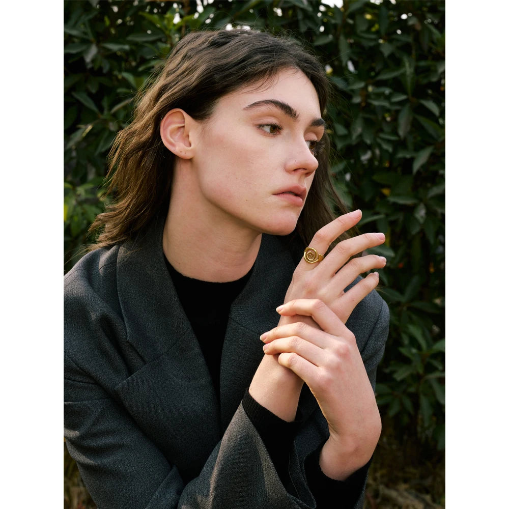 Geometric ring in gold-plated stainless steel.