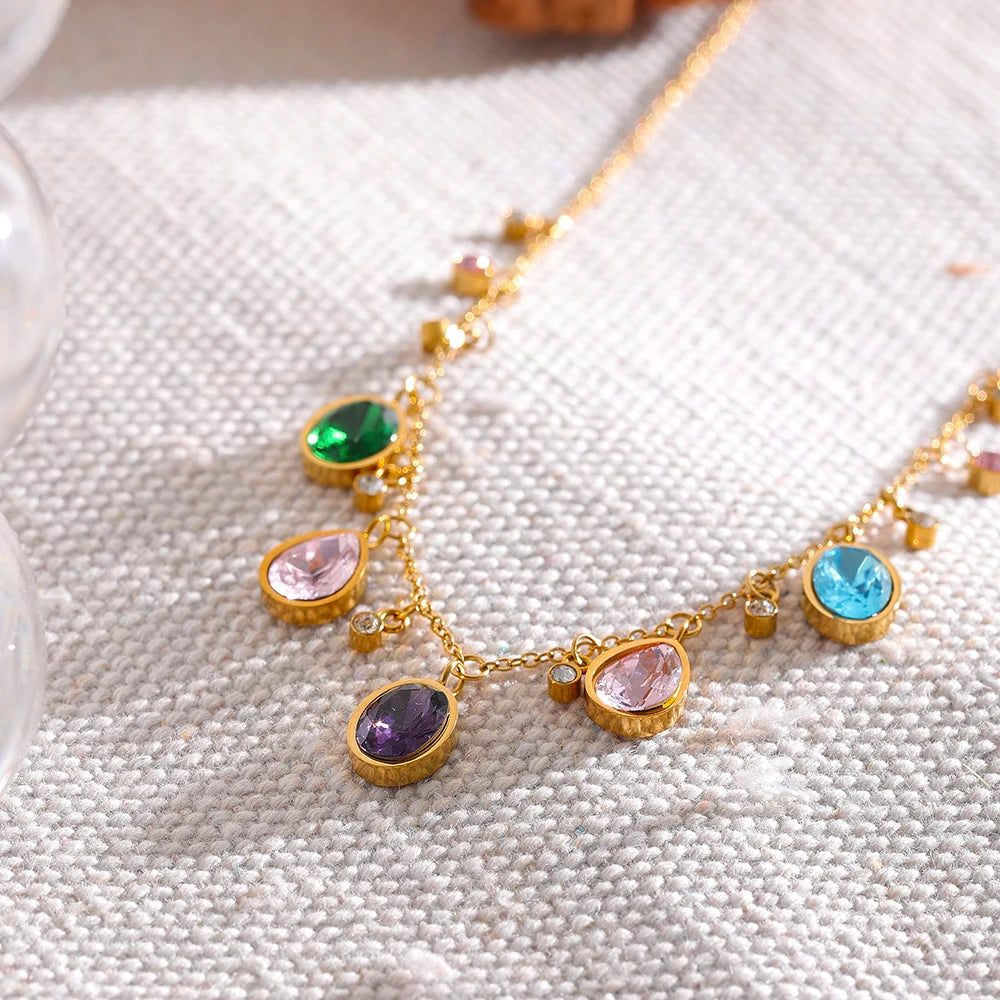 Cubic zirconia multi-color geometric necklace in gold-plated stainless steel with cubic zirconia.