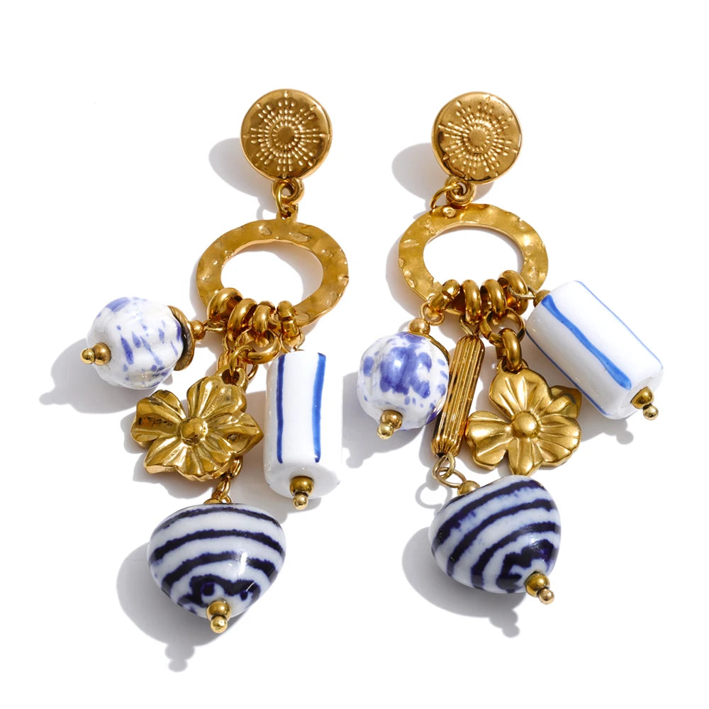 Blue heart flower earrings in gold-plated stainless steel.