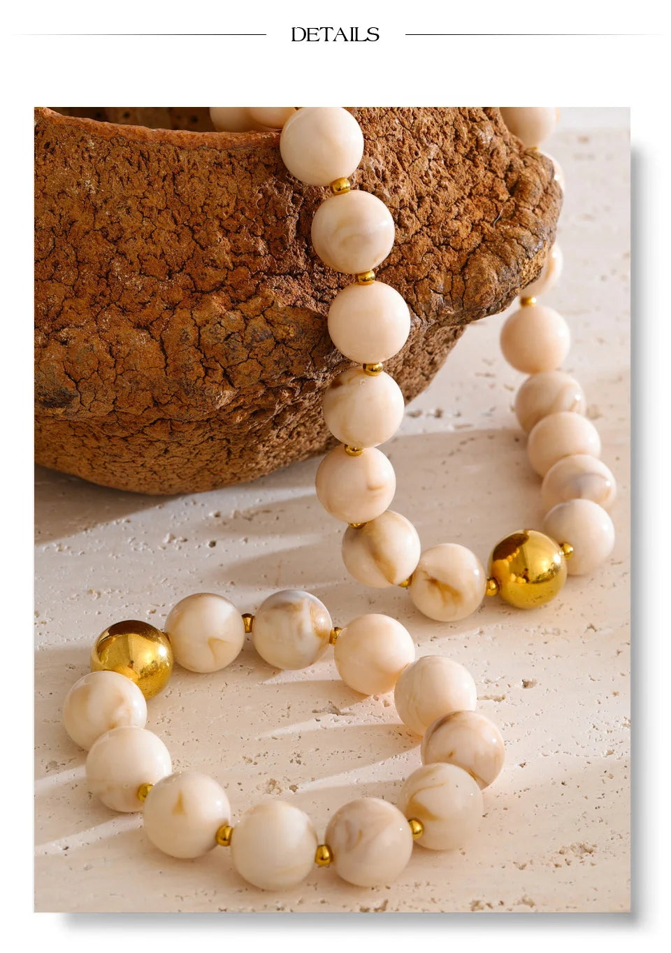 Resin beaded multi-color necklace in gold-plated stainless steel with resin.