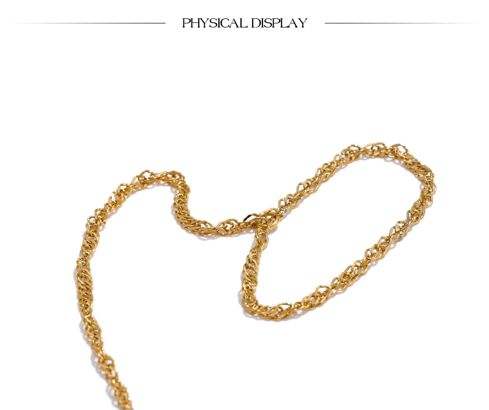 Minimalist geometric chain necklace in gold-plated stainless steel.