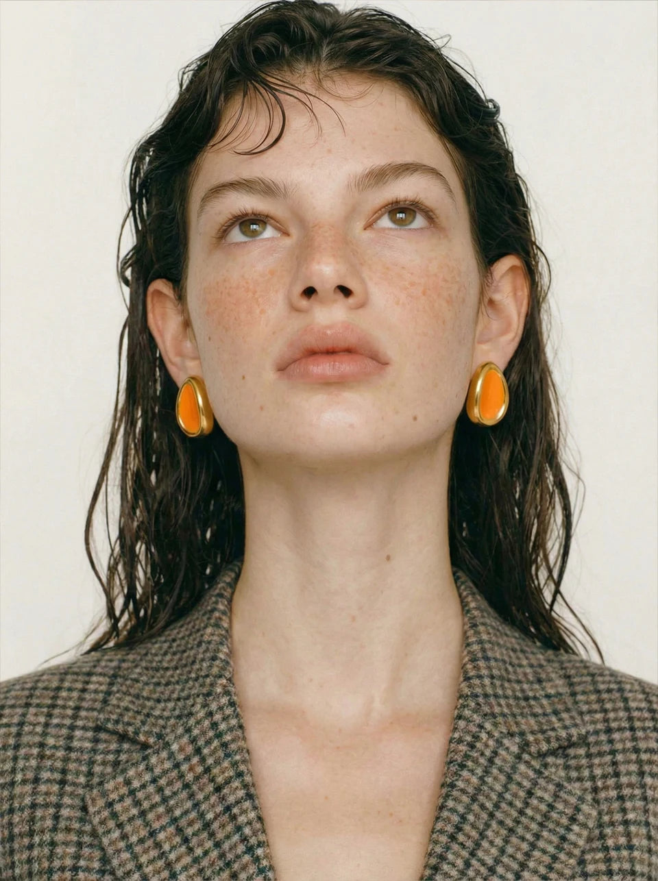 Enamel multi-color geometric earrings in gold-plated stainless steel with enamel.
