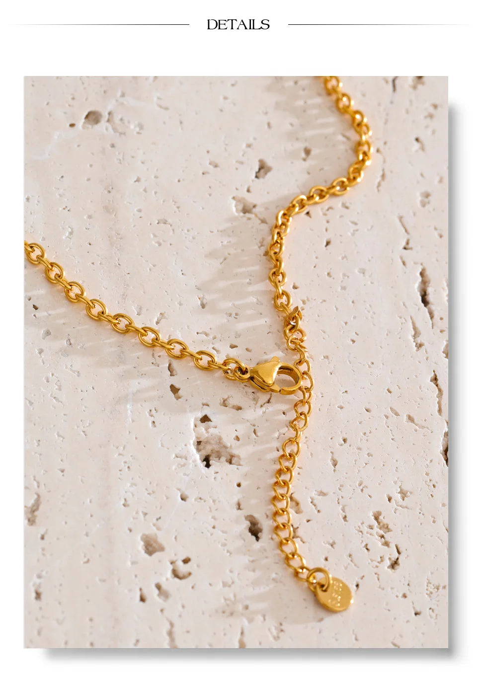 Cubic zirconia geometric chain necklace in gold-plated stainless steel with cubic zirconia.