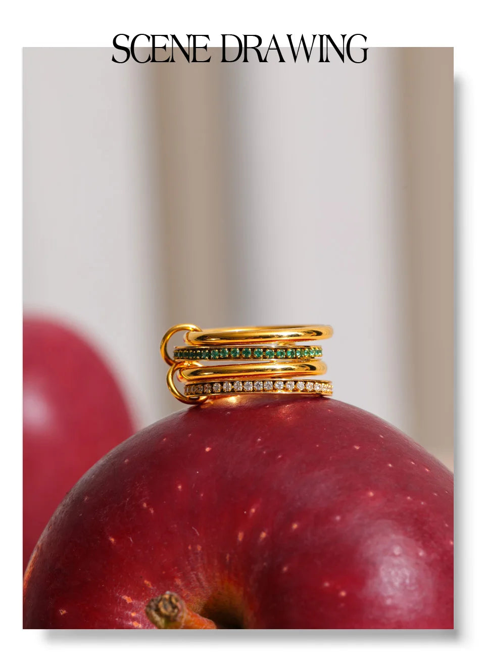 White cubic zirconia geometric ring in 18K gold-plated stainless steel with cubic zirconia.