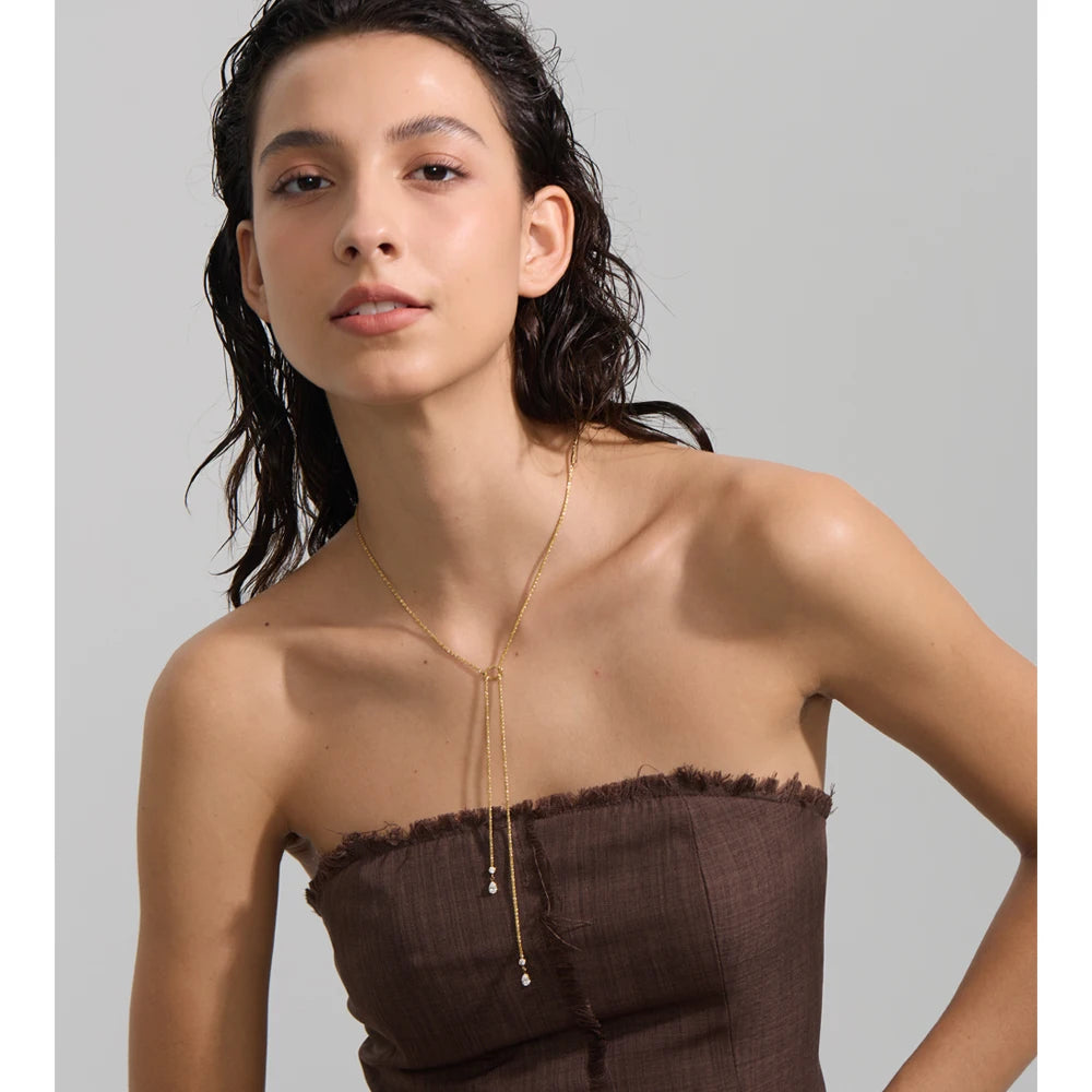 Cubic zirconia geometric chain necklace in gold-plated stainless steel with cubic zirconia.