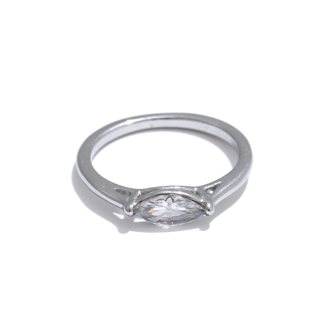 Cubic zirconia geometric ring in 18K gold-plated stainless steel with cubic zirconia.
