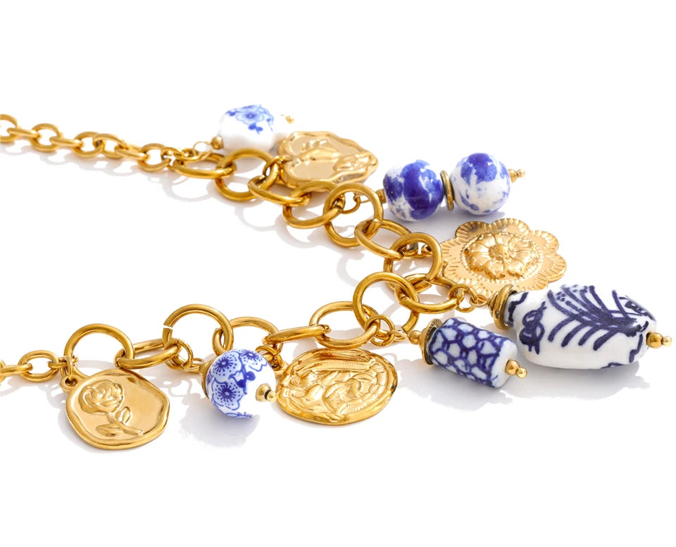 Heart flower star necklace in gold-plated stainless steel.