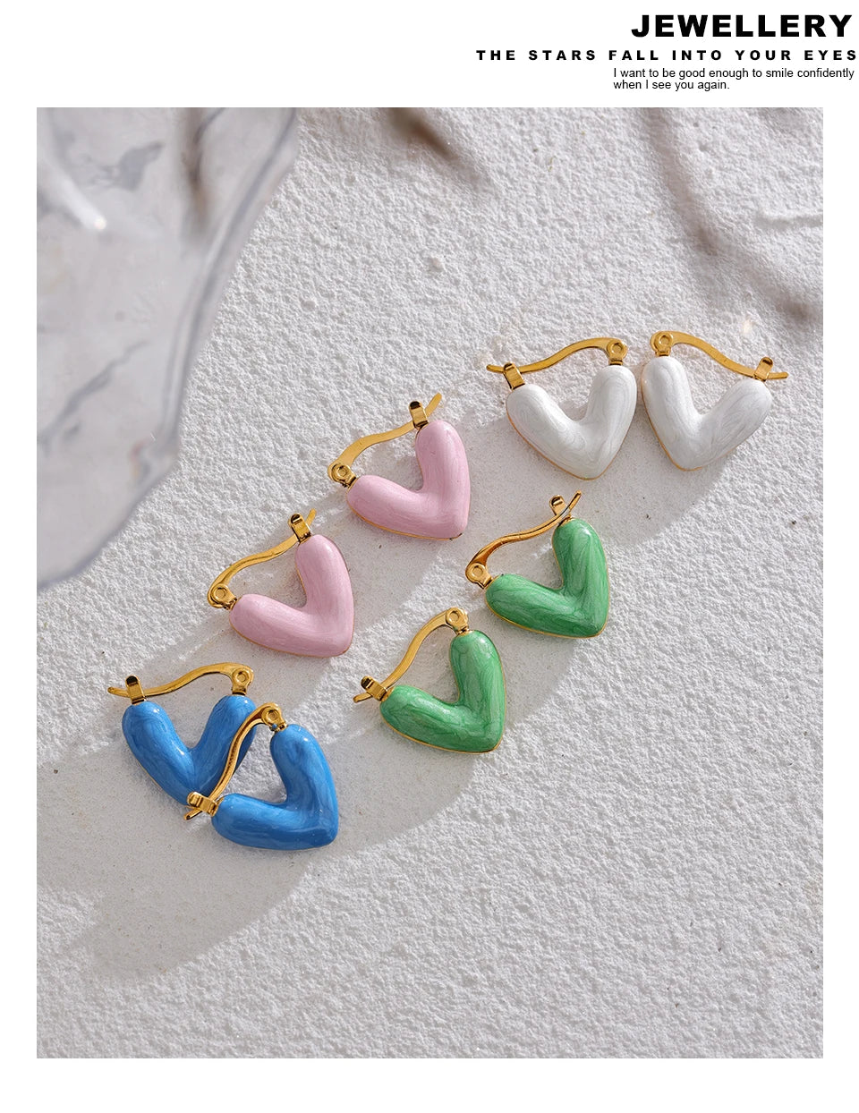 White enamel heart earrings in gold-plated stainless steel with enamel.