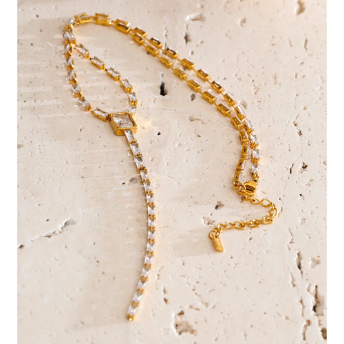 Cubic zirconia geometric chain necklace in gold-plated stainless steel with cubic zirconia.