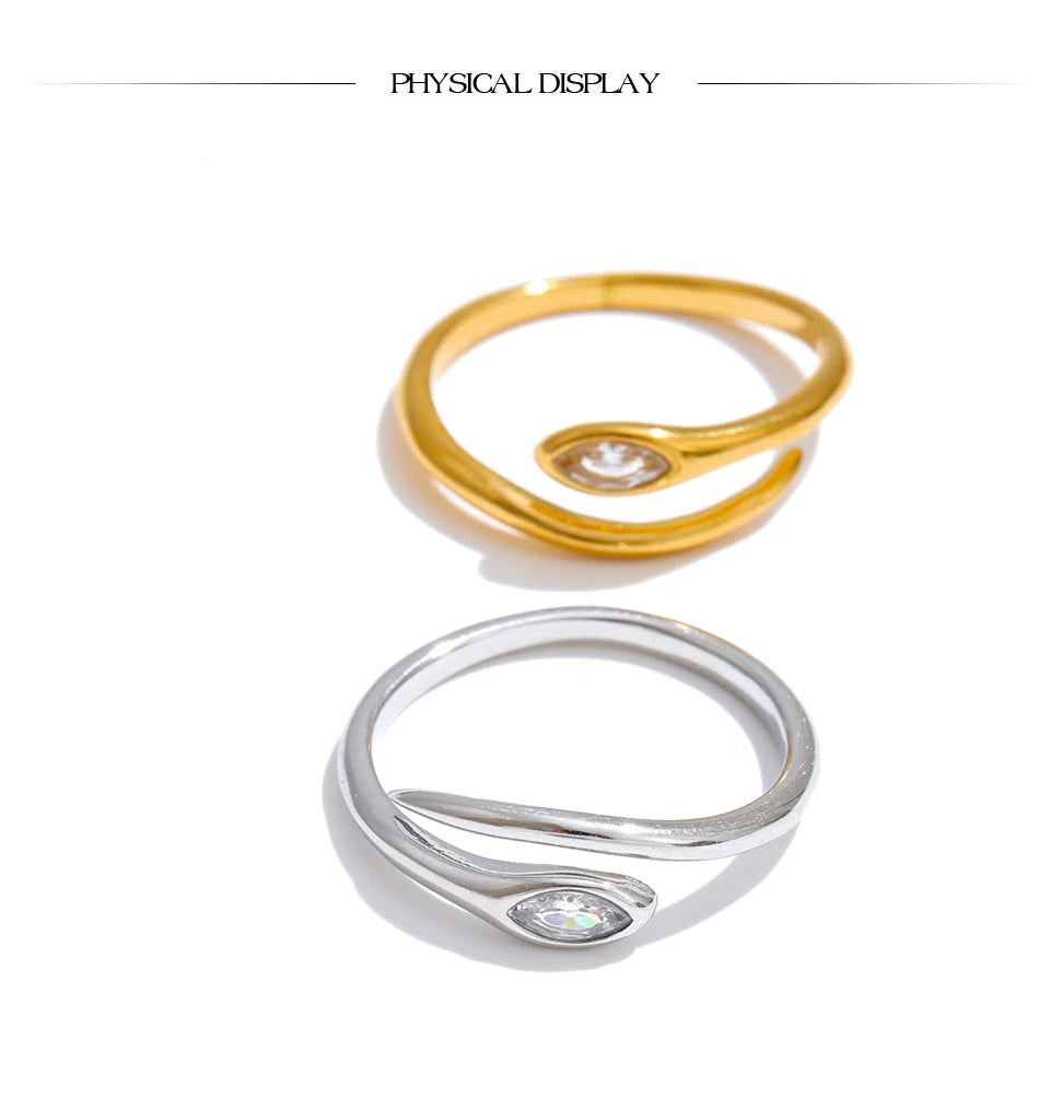 Cubic zirconia snake geometric ring in 18K gold-plated stainless steel with cubic zirconia.