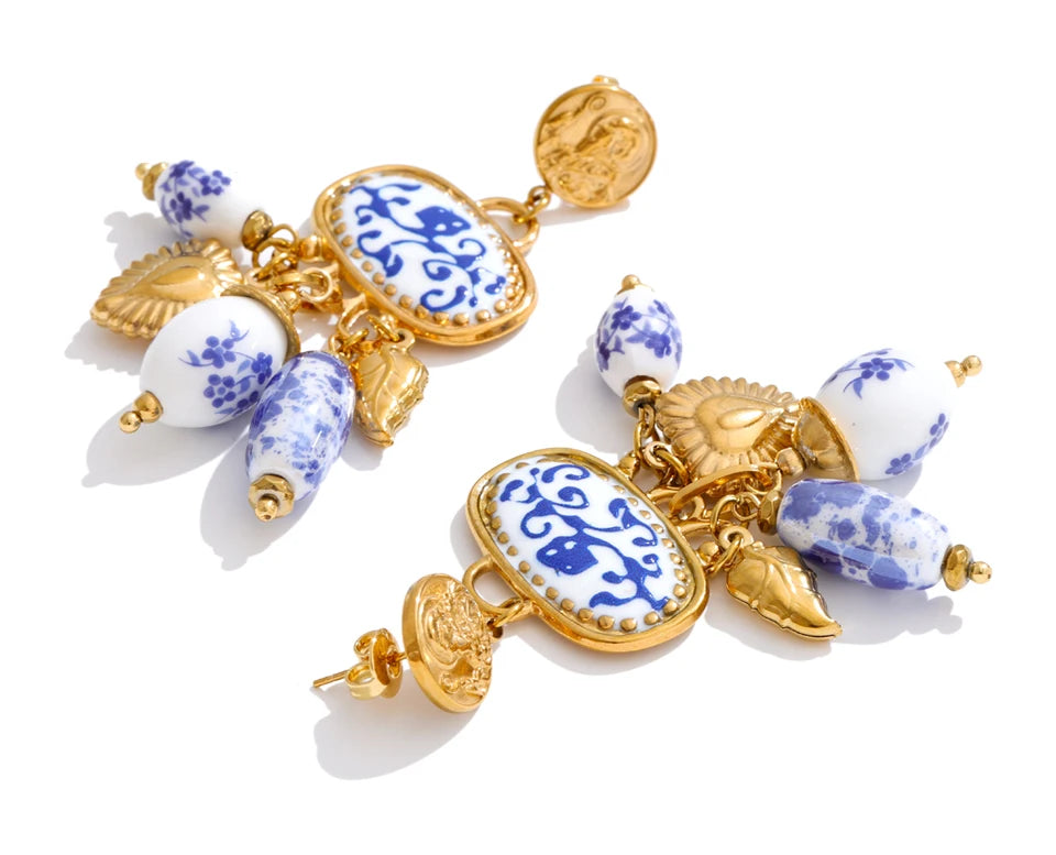 Blue heart flower earrings in gold-plated stainless steel.