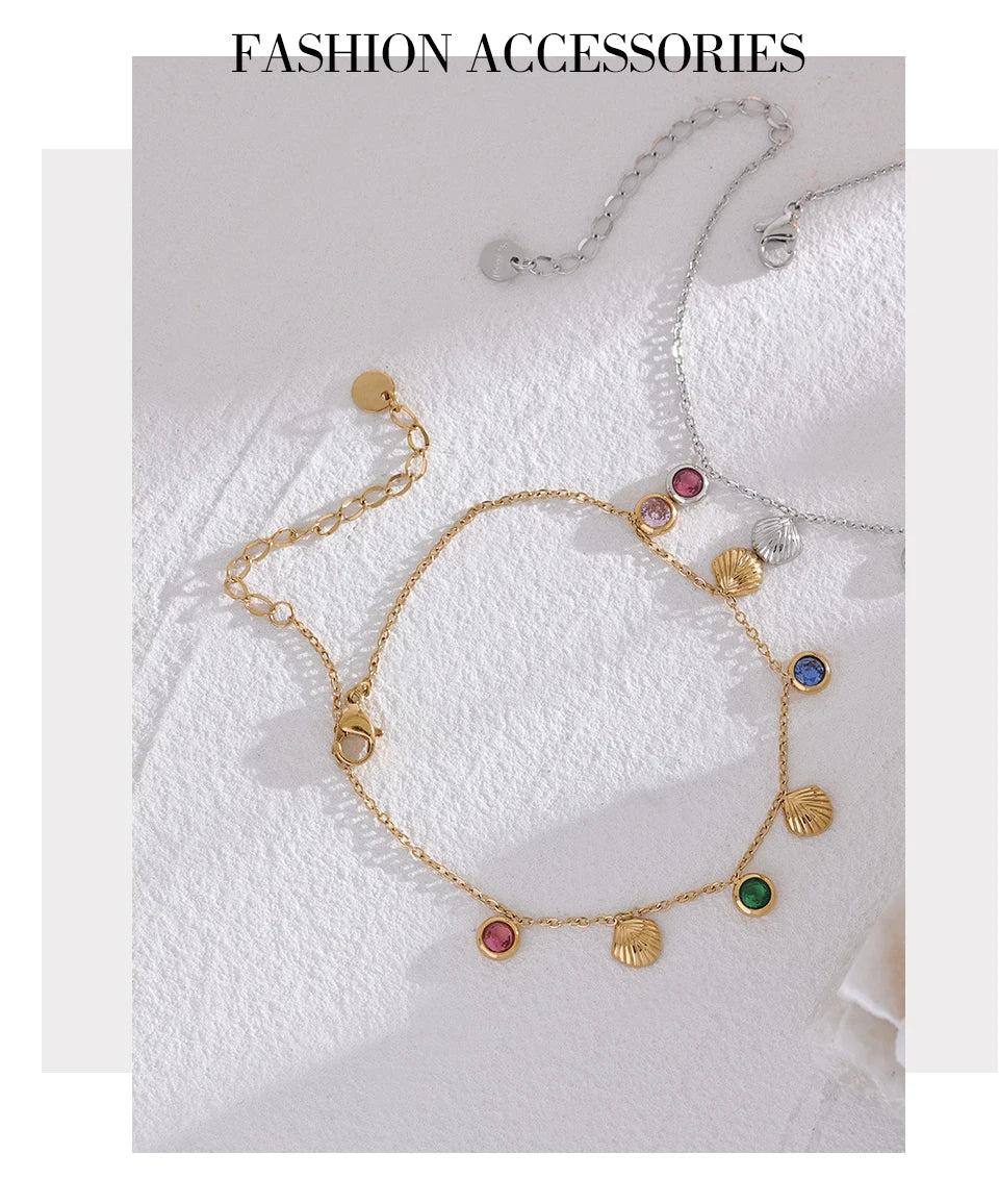 Cubic zirconia shell multi-color anklet in gold-plated stainless steel with cubic zirconia and shell.