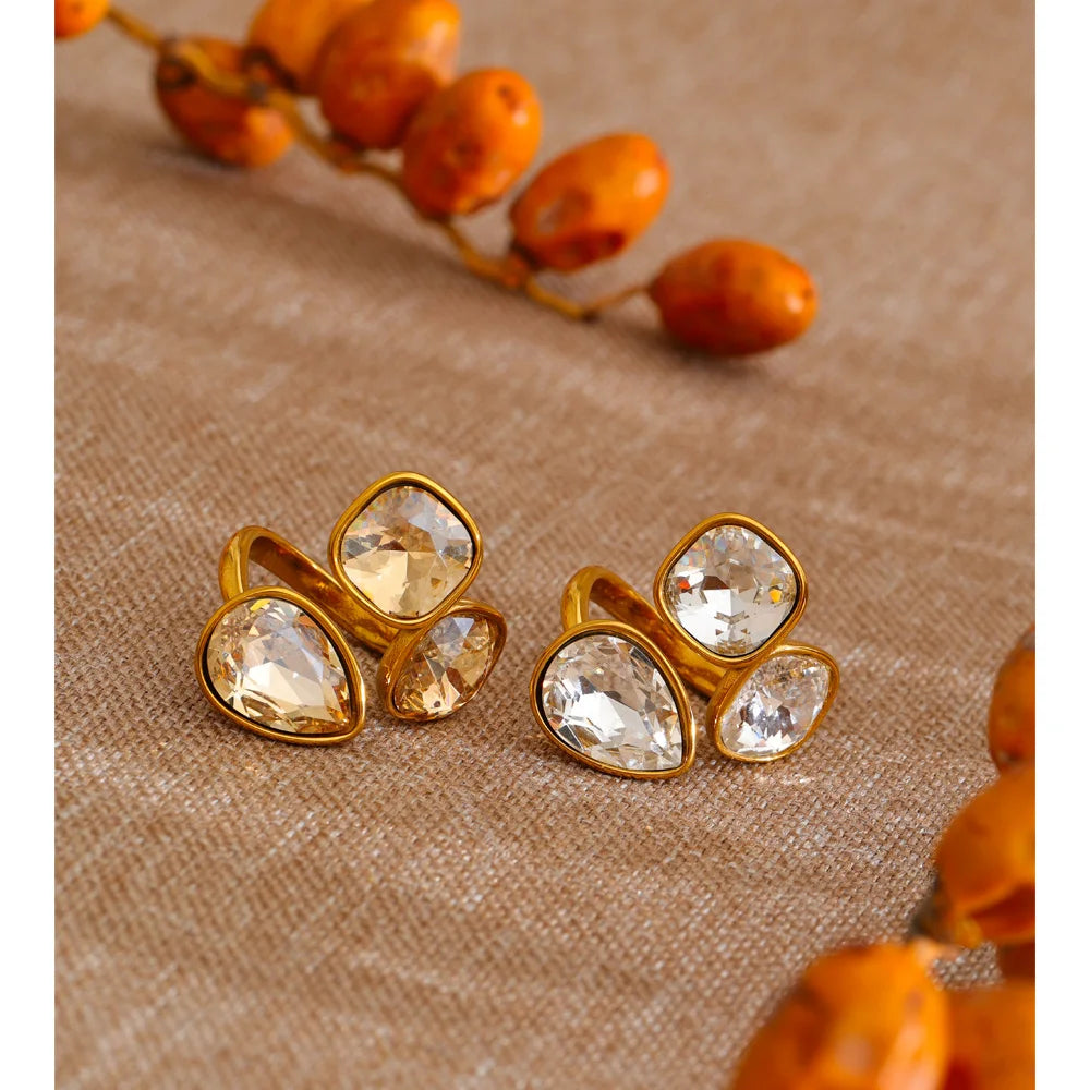 Crystal multi-color geometric ring in 18K gold-plated stainless steel with crystal.
