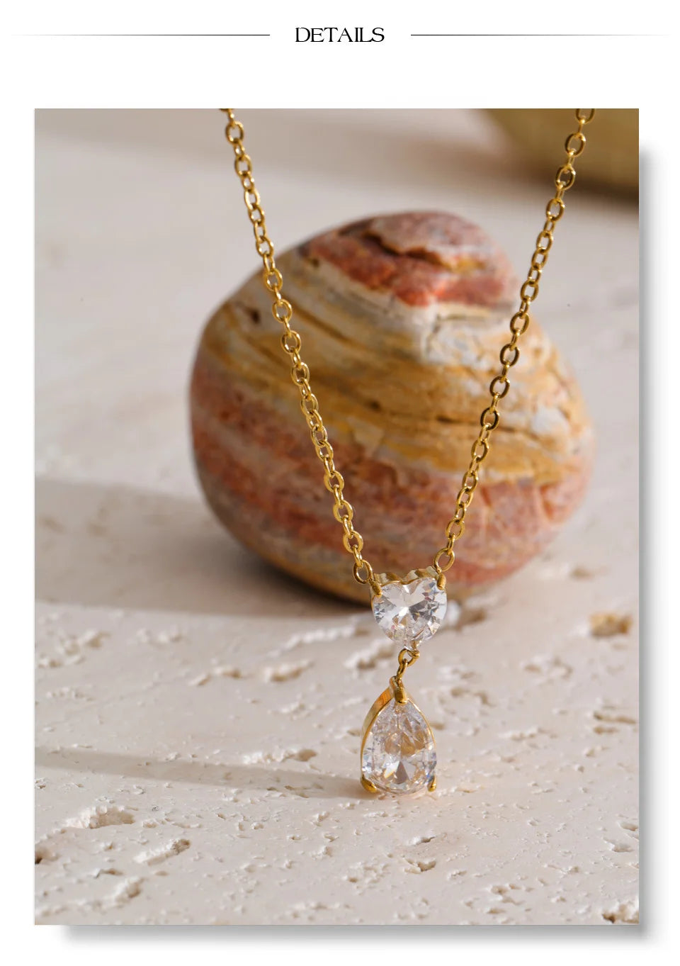 Cubic zirconia heart necklace in gold-plated stainless steel with cubic zirconia.